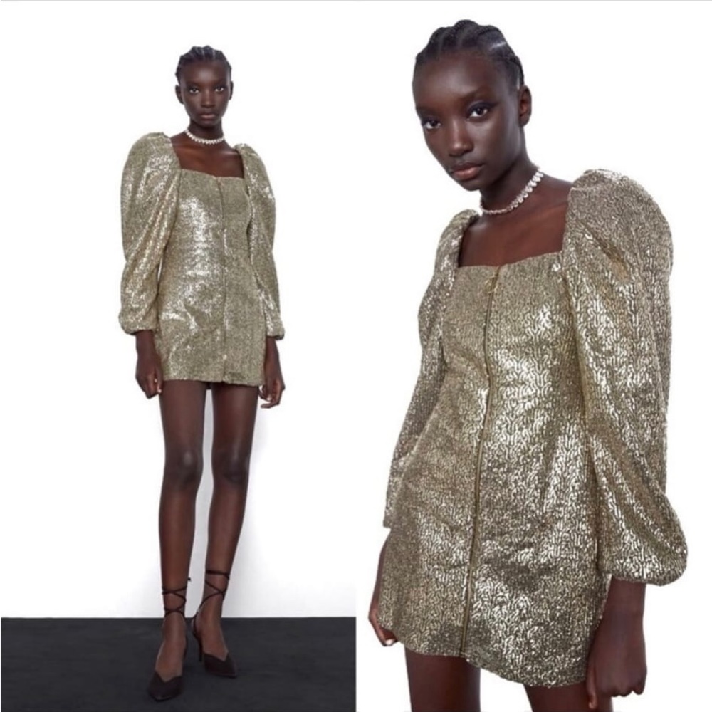 Puff sleeves. Festive dress brand new with tags.